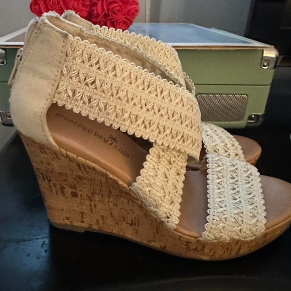 white wedge heels with a cork style bottom and zip up
size 5 by Montego Bay Club - Picture 1 of 4